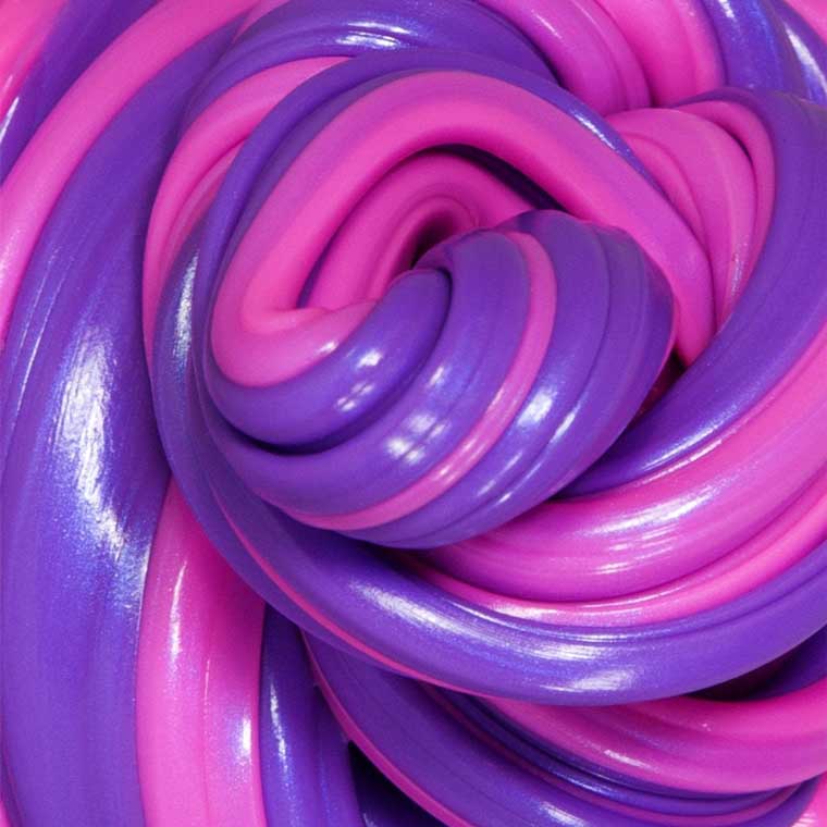 Close up detail of purple and pink heat sensitive Hypercolor® Thinking Putty®.