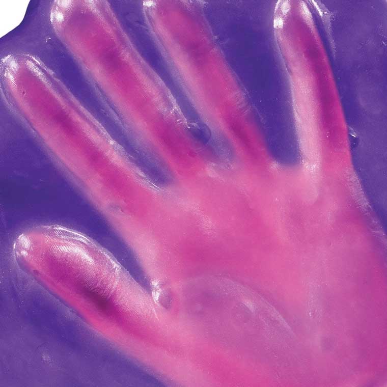 Close up detail of heat sensitive color changing purple and pink putty.