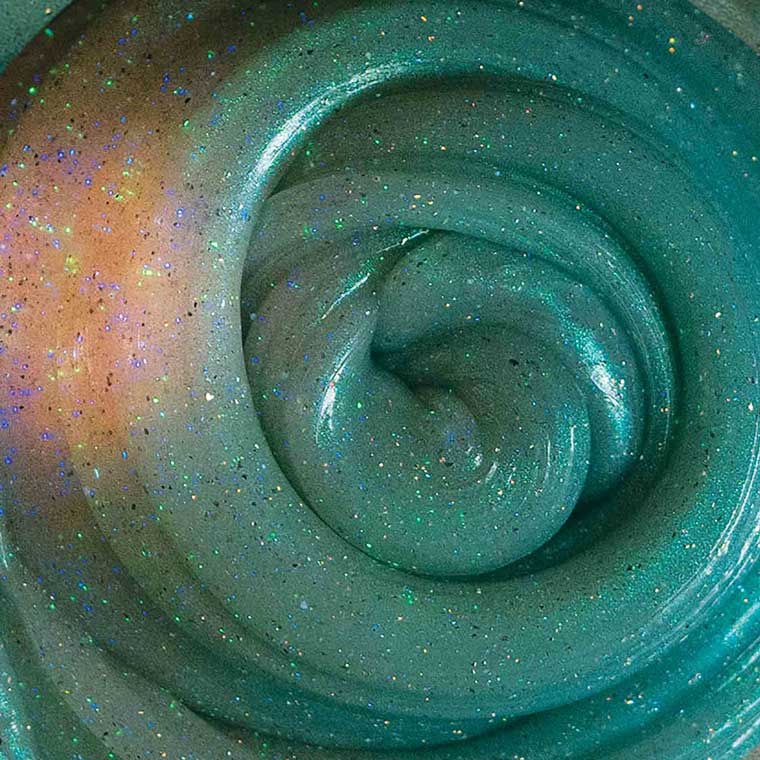 Close up glow detail of teal putty.