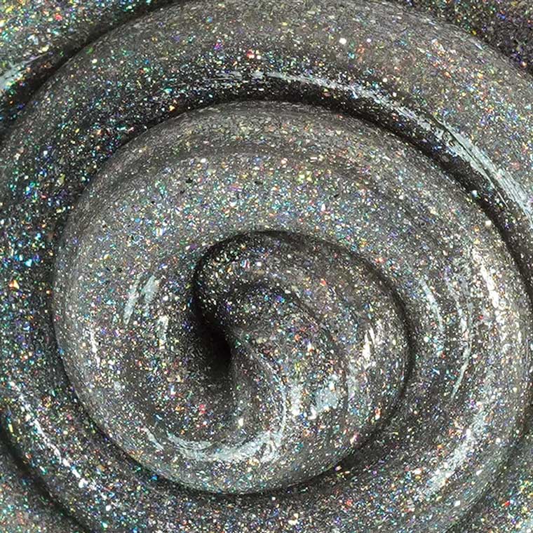 Close up texture of silver holographic putty.