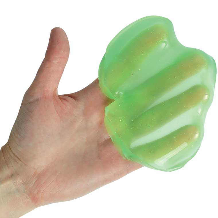 Hand holding clear green putty.