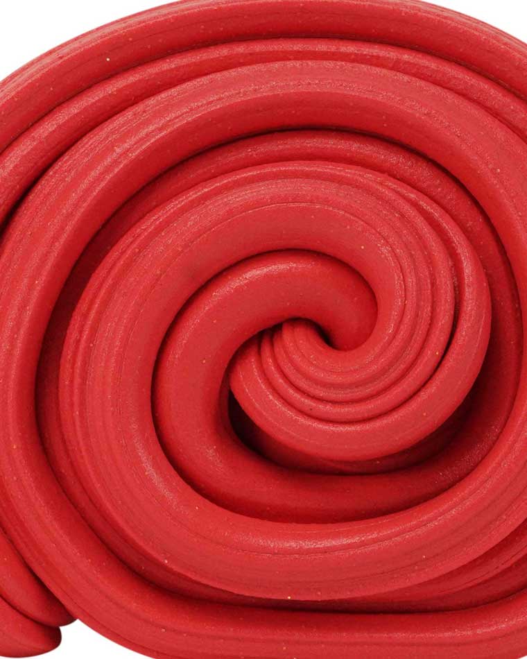 Close up detail of texture of red cinnamon scented Thinking Putty®.